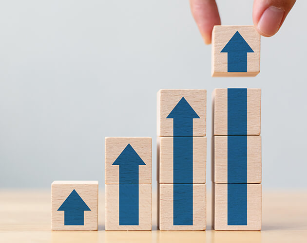 Arrows on blocks indicating growth